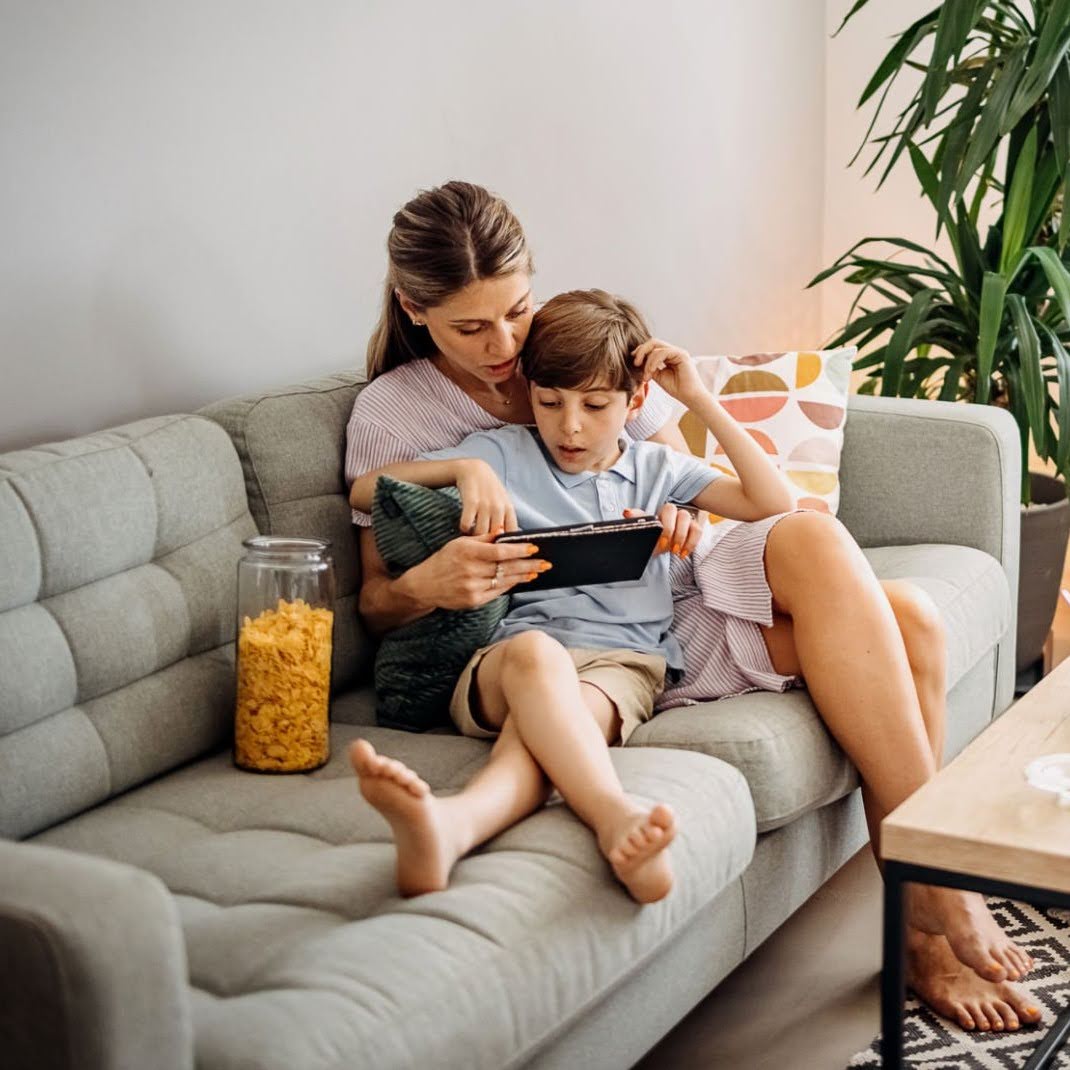 Happy family enjoying comfort after St. Charles HVAC service